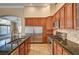 Open concept kitchen showcases stainless steel appliances, granite countertops and lots of cabinet space at 8851 Quintane Ln, Las Vegas, NV 89123