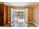 View through open French doors leading to an outdoor patio with gazebo at 8851 Quintane Ln, Las Vegas, NV 89123