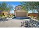 Inviting two-story home with a well-maintained front yard and attached two-car garage at 8853 Autumn Teal Ave, Las Vegas, NV 89178