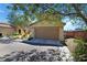 Inviting two-story home with a well-maintained front yard and attached two-car garage at 8853 Autumn Teal Ave, Las Vegas, NV 89178