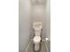 A small powder room featuring a toilet with an elephant art piece above it at 8853 Autumn Teal Ave, Las Vegas, NV 89178