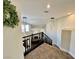 Open foyer with modern lighting fixtures overlooking the living room at 8913 Saint Pierre Dr, Las Vegas, NV 89134