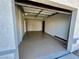 Attached two car garage features epoxy flooring and ample space at 8913 Saint Pierre Dr, Las Vegas, NV 89134