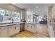 Open kitchen featuring stainless appliances, granite counters, and an eat-in island at 8913 Saint Pierre Dr, Las Vegas, NV 89134