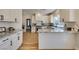 Bright kitchen with granite counters, stainless appliances, and white cabinets at 8913 Saint Pierre Dr, Las Vegas, NV 89134