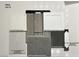 Selection of interior design materials includes AZT Quartz pebble white, DT Vicinity gray brown, and Shaw Bay concrete at 91 Tardando Ave, Henderson, NV 89015