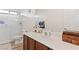 Bright bathroom features modern fixtures, white countertops, and shower with glass doors at 9494 Alma Ridge Ave, Las Vegas, NV 89178