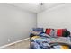 This bedroom features a ceiling fan and a fun theme at 9494 Alma Ridge Ave, Las Vegas, NV 89178