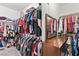 Spacious walk-in closet providing ample storage and organization with clothing racks and shelves at 9494 Alma Ridge Ave, Las Vegas, NV 89178