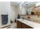 This bathroom features a single sink vanity, a toilet, and a shower-tub combo at 9865 Penny Ln, Las Vegas, NV 89178