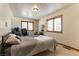 Bedroom with neutral walls, carpeted floors, and natural light at 9865 Penny Ln, Las Vegas, NV 89178