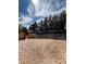 Expansive outdoor area with fencing and open space, perfect for livestock or recreational use at 9865 Penny Ln, Las Vegas, NV 89178