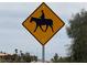 Scenic area with horse crossing; ideal for equine enthusiasts and recreational riding at 9865 Penny Ln, Las Vegas, NV 89178