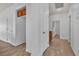 Hallway with built-in storage and doors leading to other rooms at 1016 Echo Beach Ave, North Las Vegas, NV 89086