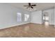 Bright living room with neutral tile flooring and ample natural light at 1016 Echo Beach Ave, North Las Vegas, NV 89086