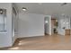 Bright living room showcasing an open floor plan and wood flooring at 10452 Niagara Falls Ln, Las Vegas, NV 89144