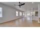 Open floor plan with hardwood floors and bright lighting showcasing the home's spacious design at 10452 Niagara Falls Ln, Las Vegas, NV 89144