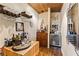 Unique bar area with rustic wood accents, ample storage for wine and spirits, and a cozy atmosphere at 12245 Olivetta Ct, Las Vegas, NV 89138