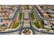 Primary-planned community boasting well-maintained streets, lush landscaping, and picturesque homes with tile roofs at 193 Elder View Dr, Las Vegas, NV 89138