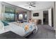 Well-lit bedroom with balcony access and mountain views for relaxation at 193 Elder View Dr, Las Vegas, NV 89138