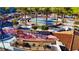 Community park with palm trees, playground, and shade structures, offering a fun and inviting space at 193 Elder View Dr, Las Vegas, NV 89138