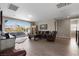 Spacious living room featuring scenic mountain views from expansive windows at 193 Elder View Dr, Las Vegas, NV 89138
