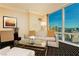Living room features a sofa, chair, large windows and a view of the city at 2000 Fashion Show Dr # 5300, Las Vegas, NV 89109