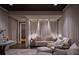 Comfortable spa room with two sofas, soft lighting, and elegant drapery at 2000 Fashion Show Dr # 5300, Las Vegas, NV 89109