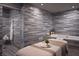 Spa room features marble tile, bathtub, massage table, and glass enclosed shower at 2000 Fashion Show Dr # 5300, Las Vegas, NV 89109