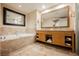 Elegant bathroom featuring a soaking tub, double vanity, and luxurious finishes at 2000 N Fashion Show Dr # 4301, Las Vegas, NV 89109