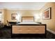 Bright hotel bedroom featuring king bed, neutral color palette, and artwork at 2000 N Fashion Show Dr # 4301, Las Vegas, NV 89109