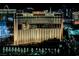 Nighttime view of the Treasure Island hotel and Casino lit up against the dark cityscape at 2000 N Fashion Show Dr # 4301, Las Vegas, NV 89109