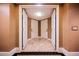 Hotel hallway with textured walls and doors leading to adjacent rooms at 2000 N Fashion Show Dr # 4301, Las Vegas, NV 89109