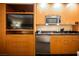 Close up of the kitchenette featuring modern appliances and granite countertops at 2000 N Fashion Show Dr # 4301, Las Vegas, NV 89109