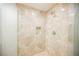 Modern shower with tile surround, built-in niche, and rainfall showerhead at 2000 N Fashion Show Dr # 4301, Las Vegas, NV 89109