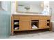 Bright bathroom showcasing double sink vanity with storage and a large mirror for a luxurious feel at 2000 N Fashion Show Dr # 4302, Las Vegas, NV 89109