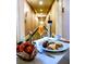 In-room breakfast spread featuring pastries, fruit, and eggs benedict at 2000 N Fashion Show Dr # 4302, Las Vegas, NV 89109