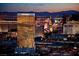 Night cityscape view featuring a Trump building, other city buildings, and mountains in the background at 2000 N Fashion Show Dr # 4302, Las Vegas, NV 89109