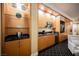 Close view of a practical kitchenette with ample cabinets and glass display shelves at 2000 N Fashion Show Dr # 4302, Las Vegas, NV 89109