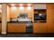 Modern kitchenette with sleek appliances and ample storage space built into the hotel room cabinets at 2000 N Fashion Show Dr # 4302, Las Vegas, NV 89109