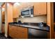 Hotel kitchenette featuring a sink, stainless steel microwave, and mini-refrigerator at 2000 N Fashion Show Dr # 4302, Las Vegas, NV 89109