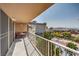 Private balcony offering seating and scenic views of the city and mountains at 205 E Harmon Ave # 1007, Las Vegas, NV 89169