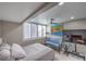 Stylish bedroom with large windows, comfortable seating, and a modern TV at 205 E Harmon Ave # 1007, Las Vegas, NV 89169