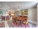 Inviting dining area adjacent to a modern kitchen, bathed in natural light at 205 E Harmon Ave # 1007, Las Vegas, NV 89169