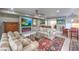 Comfortable living room with fireplace, plush seating, and stylish decor on an elegant area rug at 205 E Harmon Ave # 1007, Las Vegas, NV 89169