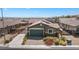 A single-story home with a well-kept yard in a quiet residential neighborhood at 2091 Hunt Woods Ct, Laughlin, NV 89029