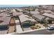 An elevated view showcases this charming single-story home's location within a vibrant community at 2091 Hunt Woods Ct, Laughlin, NV 89029