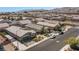 A neighborhood showcasing a home with green spaces, in a residential community, perfect for families at 2091 Hunt Woods Ct, Laughlin, NV 89029