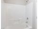 Bathroom with white tile surround, shower head, tub and chrome fixtures at 2091 Hunt Woods Ct, Laughlin, NV 89029