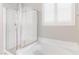 Bathroom boasts a large soaking tub and separate glass-enclosed shower at 2091 Hunt Woods Ct, Laughlin, NV 89029
